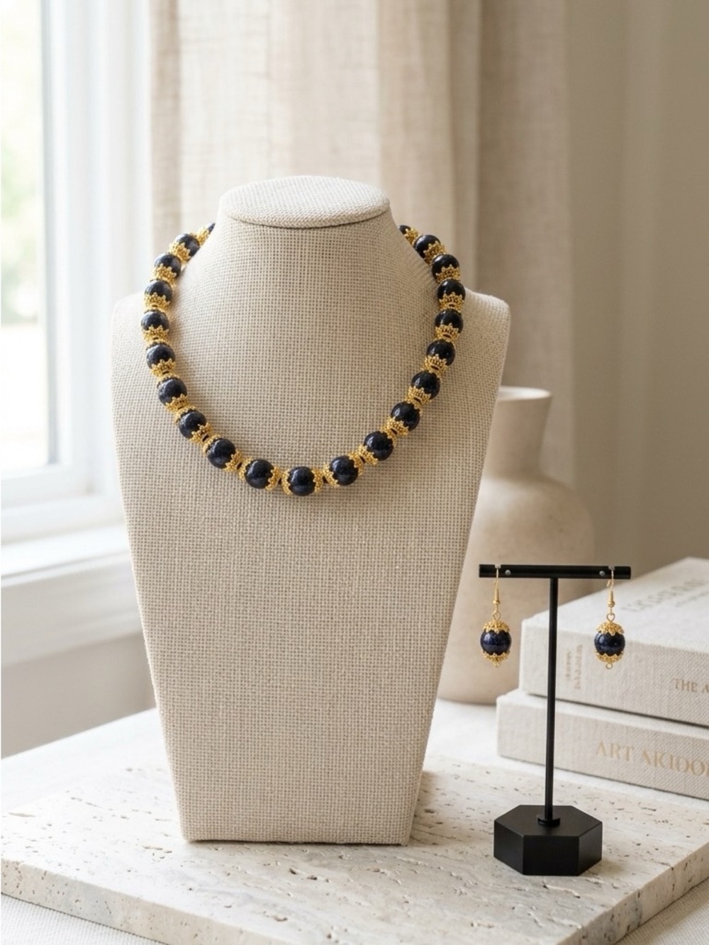 Gold tone and Navy Sunstone Statement Necklace and Earring Set